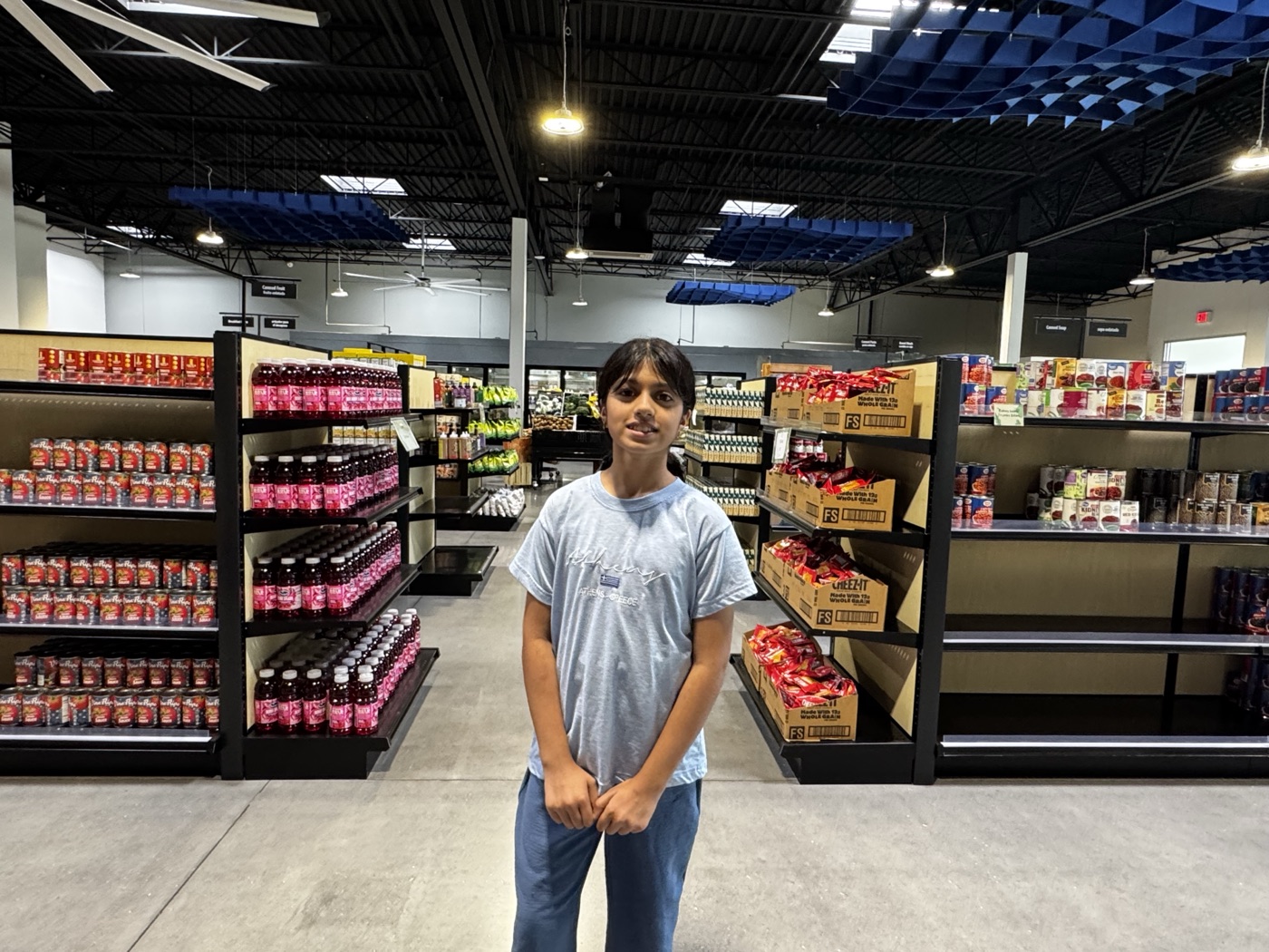 Inside the 6 Stones pantry, rows of shelves stocked with food